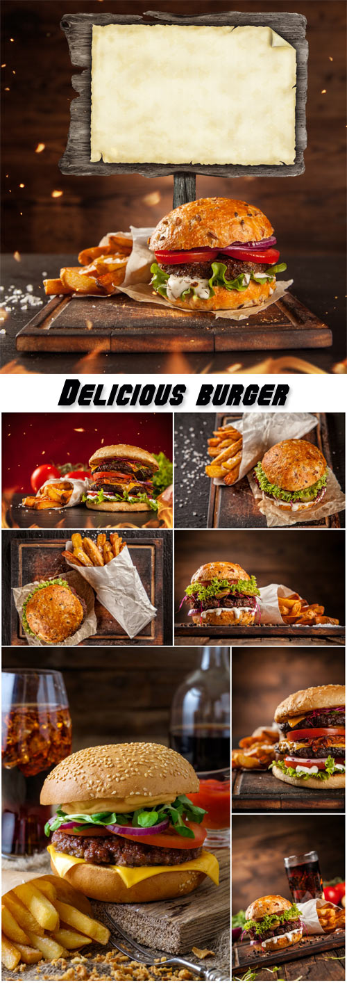 Delicious burger with chips and soda on wooden table